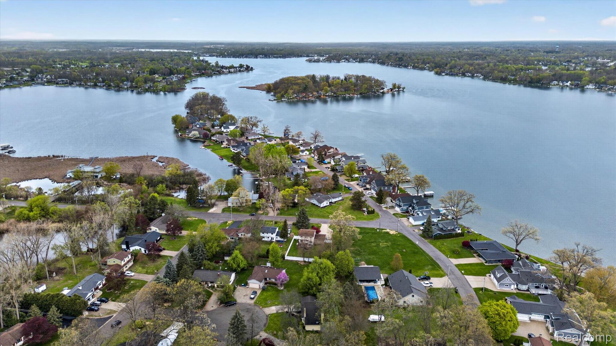 2264 Crane Road Fenton, MI 48430 - Photo 47 of 55 Aerial view of residential area with a large body of water