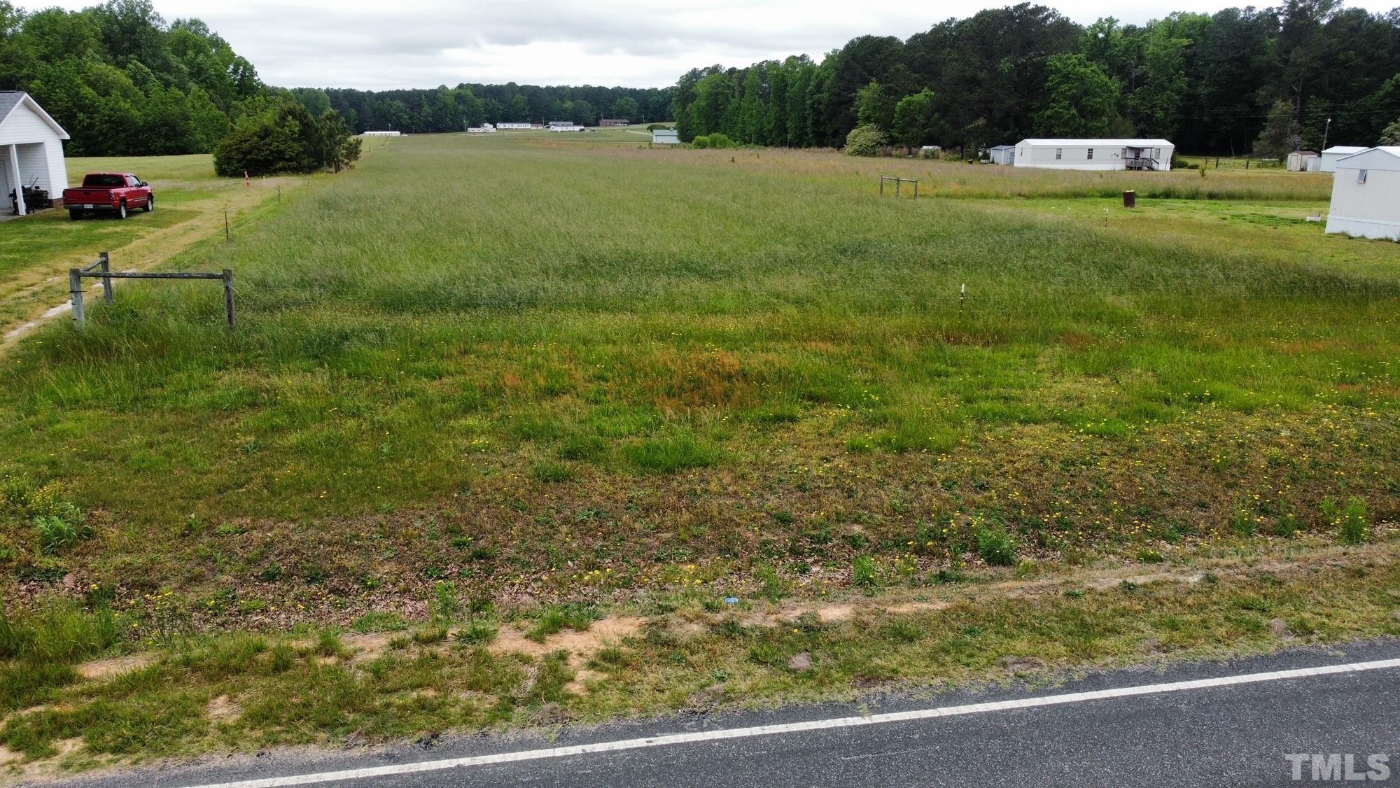 0 T T-Model Jones Road Castalia, NC 27816 - Photo 6 of 6 a view of a garden with an outdoor space