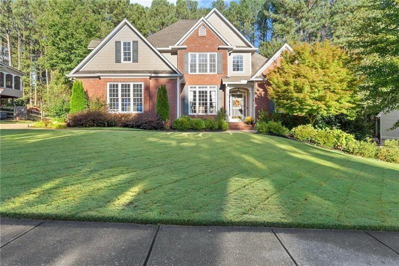385 Graves Road Acworth, GA 30101 - Photo 11 of 61 a front view of a house with a yard