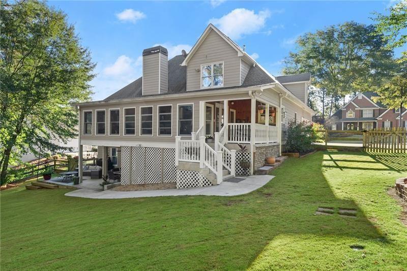 385 Graves Road Acworth, GA 30101 - Photo 42 of 61 a front view of a house with garden