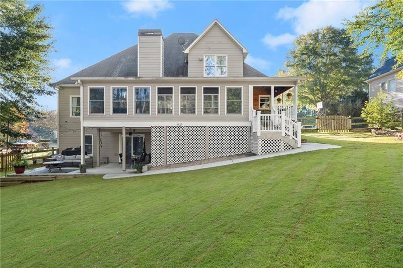 385 Graves Road Acworth, GA 30101 - Photo 43 of 61 a view of a house with a yard and sitting area