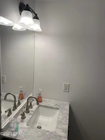 a bathroom with a shower and bathtub
