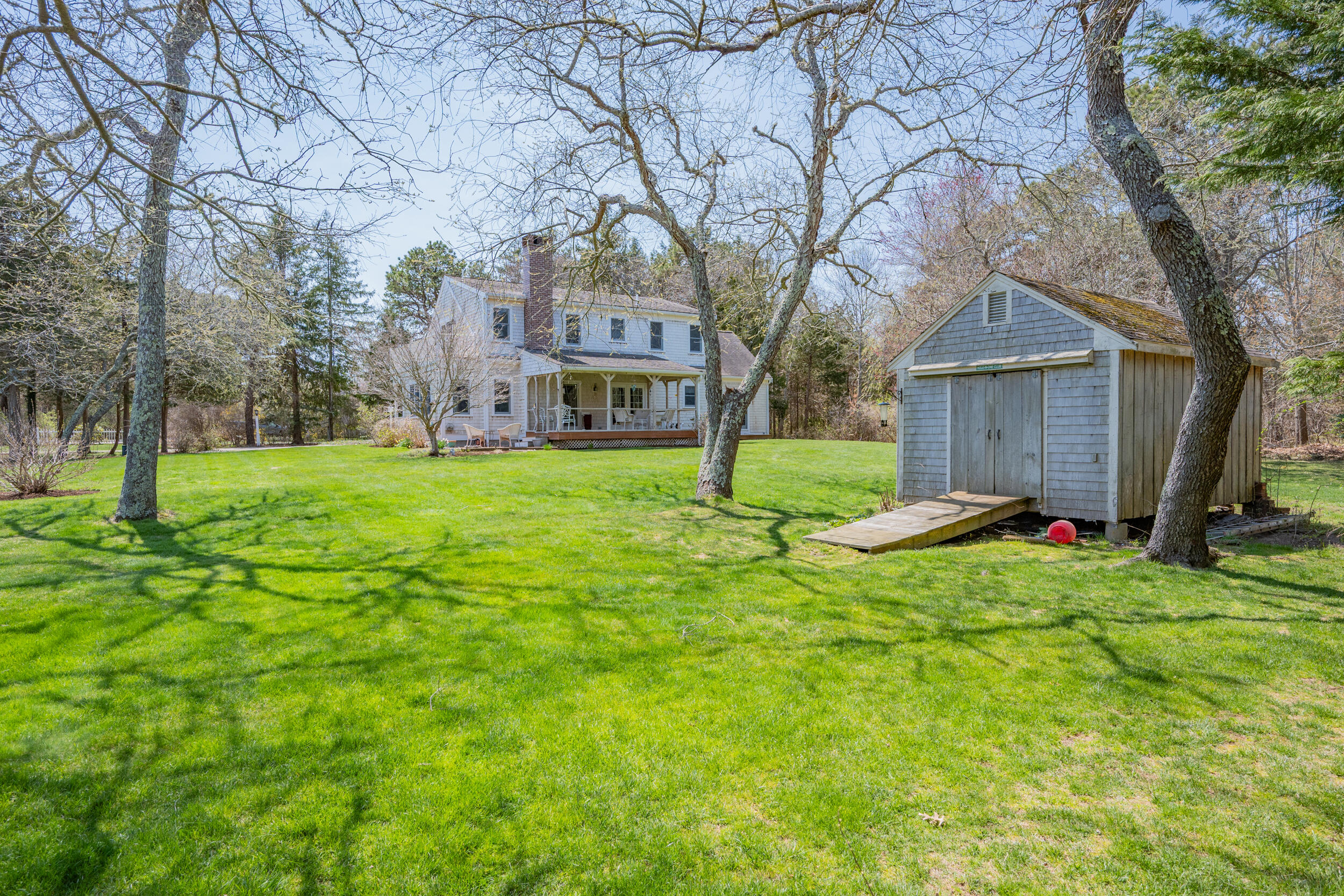 3528 Main Street Barnstable, MA 02630 - Photo 37 of 52 a view of a house with a yard and tree s