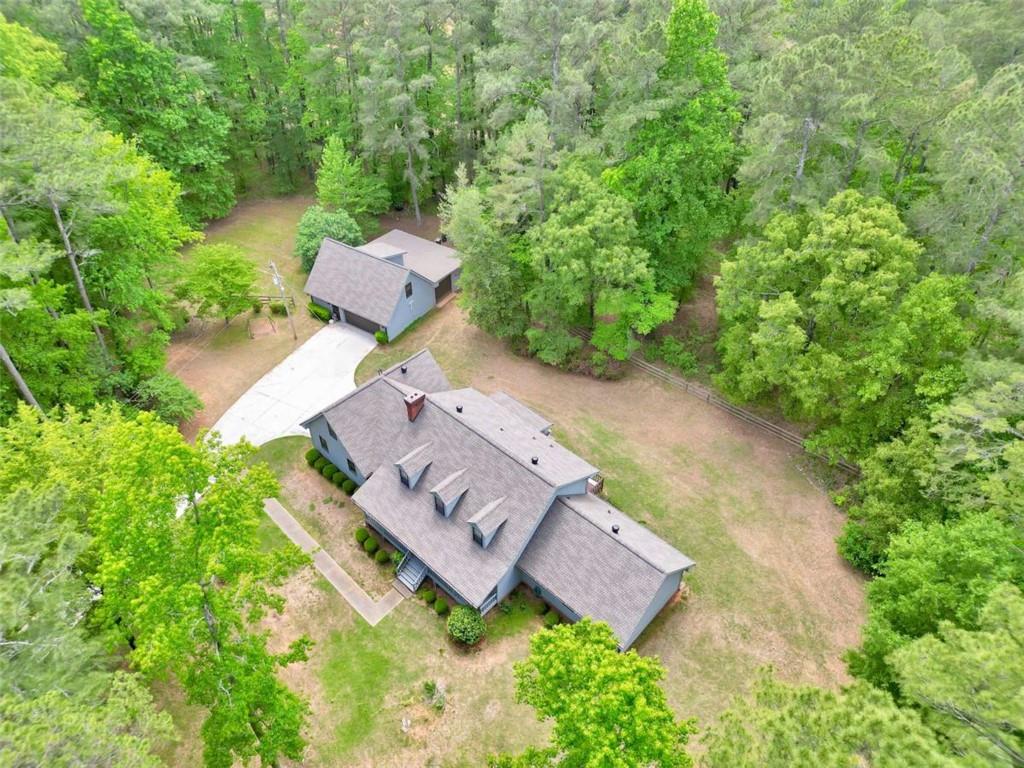 314 Winding Stream Trail Southwest Conyers, GA 30094 - Photo 58 of 59 an aerial view of a house with a yard