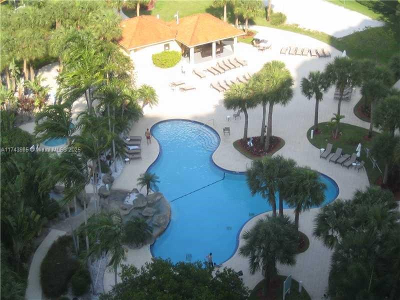 3300 Northeast 191st Street, Unit 1708 Aventura, FL 33180 - Photo 7 of 7 a view of a swimming pool and outside space