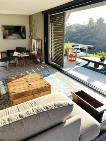 a living room with a couch and a table