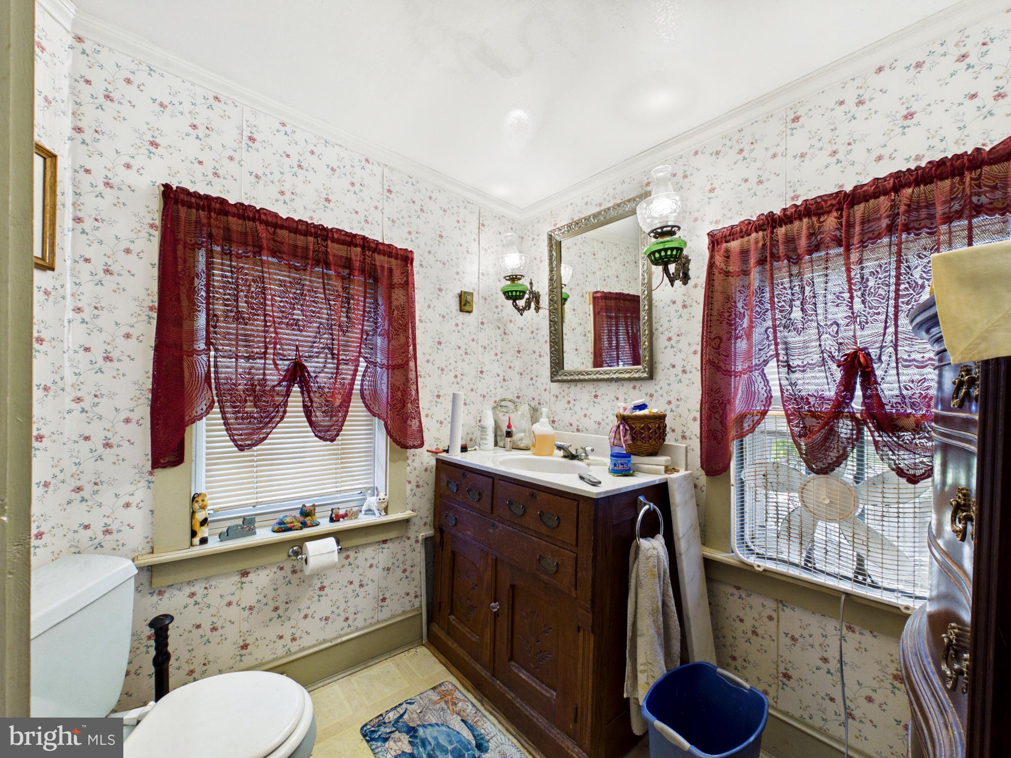 20488 Nanticoke Road Nanticoke, MD 21840 - Photo 17 of 32 Charming vintage bathroom retreat.