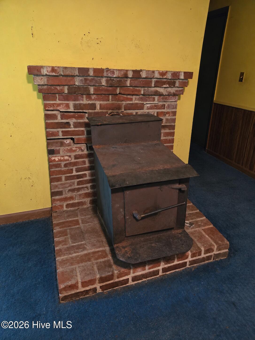 3223 Chandler Road Vanceboro, NC 28586 - Photo 24 of 27 ChatGPT Image Sep 10, 2026, 07_10_24 PM Wood stove, not currently in use
