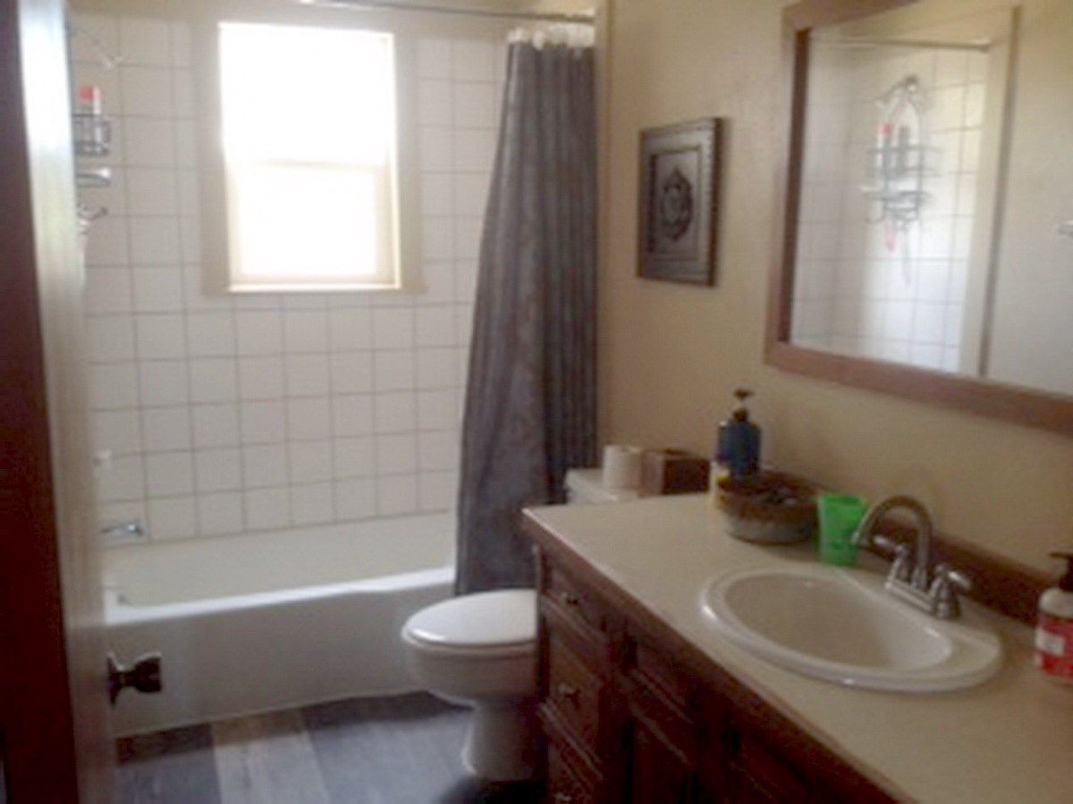 2012 J J 1/2 Road Fruita, CO 81521 - Photo 16 of 36 a bathroom with a sink a toilet and shower