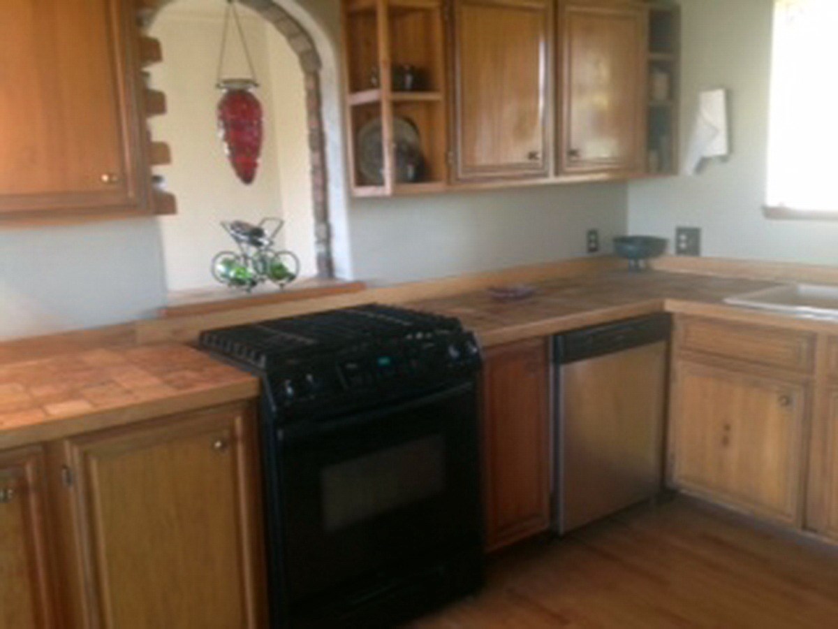 2012 J J 1/2 Road Fruita, CO 81521 - Photo 5 of 36 a kitchen with a stove and a microwave
