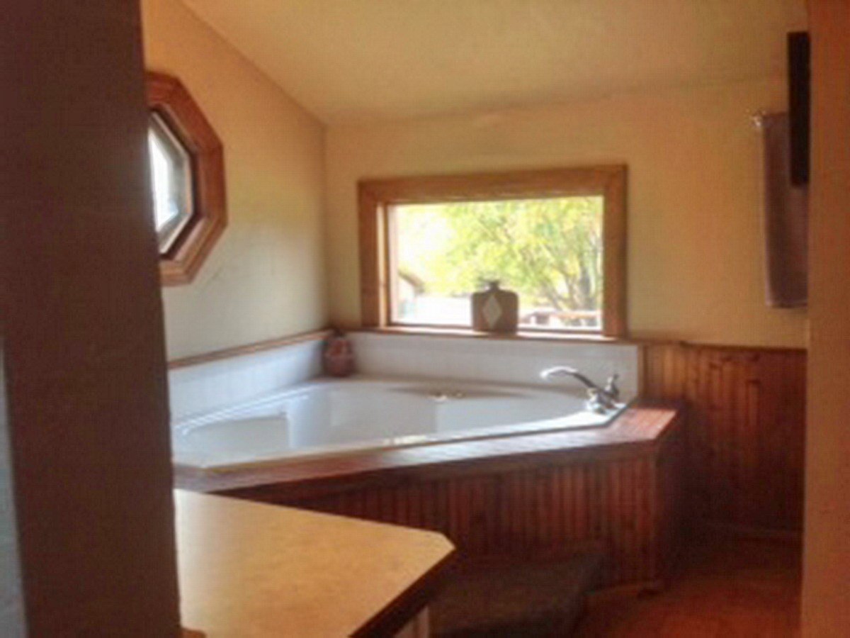 2012 J J 1/2 Road Fruita, CO 81521 - Photo 10 of 36 a view of a living room with a large window