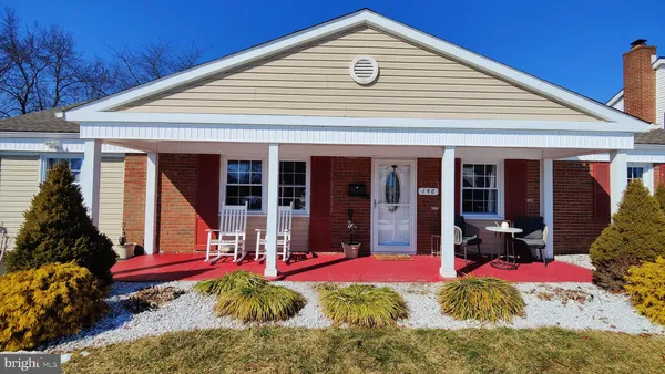 a front view of a house having patio