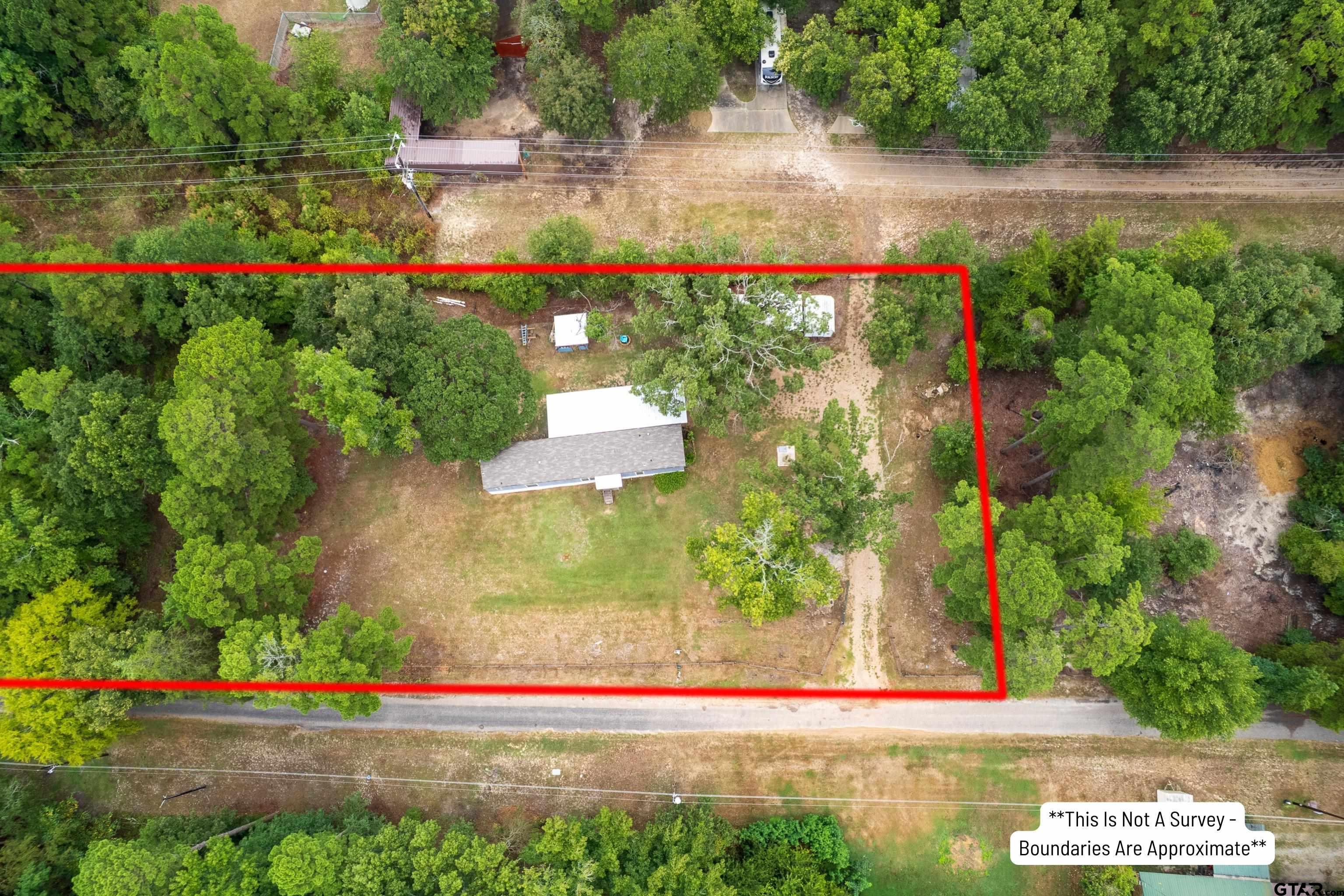 108 Sandy Brown Road Scroggins, TX 75480 - Photo 3 of 17 a view of green field