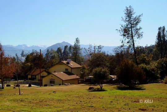 595 Evans Road Wofford Heights, CA 93285 - Photo 42 of 43 a view of a lake with a mountain