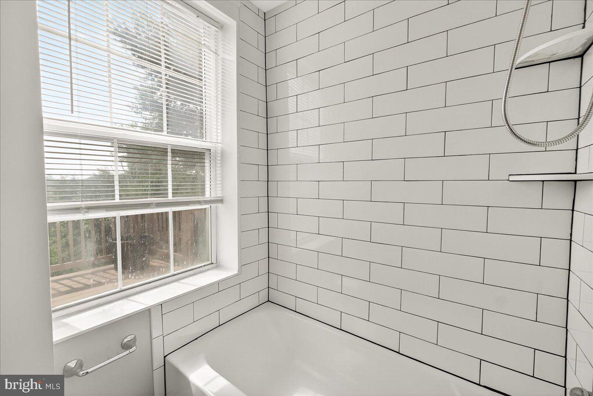 6215 South Clifton Road Braddock Heights, MD 21703 - Photo 12 of 46 a bathroom with a window