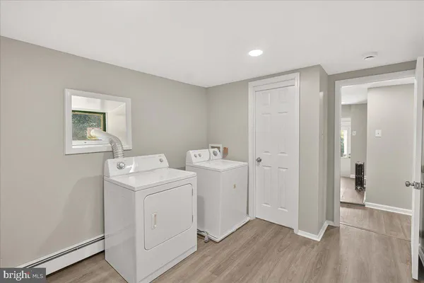 a view of utility room with washer and dryer