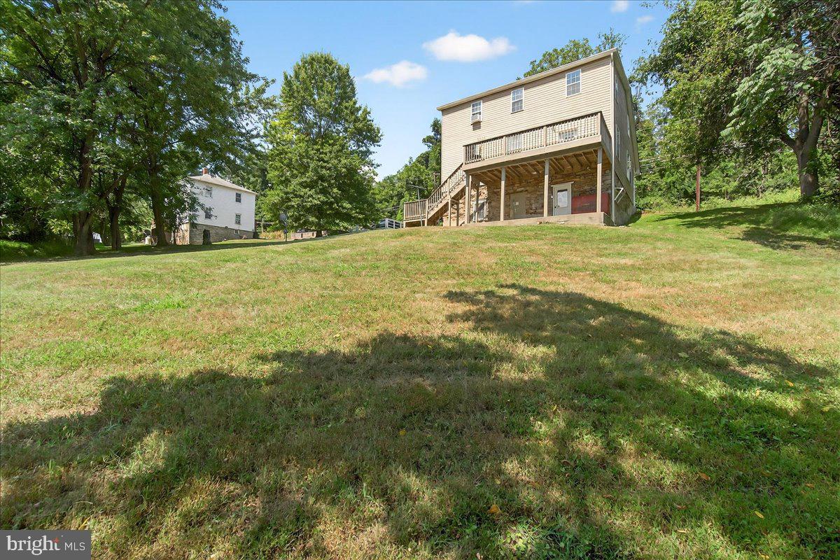 6215 South Clifton Road Braddock Heights, MD 21703 - Photo 40 of 46 a view of a house with a yard