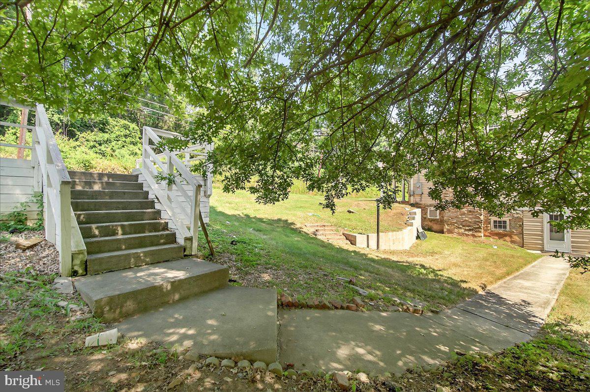 6215 South Clifton Road Braddock Heights, MD 21703 - Photo 46 of 46 a view of a yard with plants and large trees