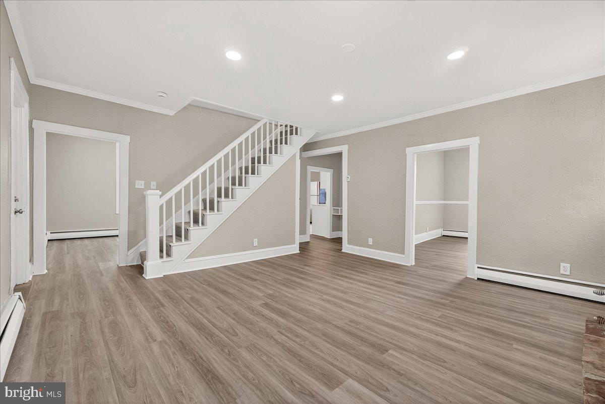 6215 South Clifton Road Braddock Heights, MD 21703 - Photo 7 of 46 a view of an empty room with wooden floor