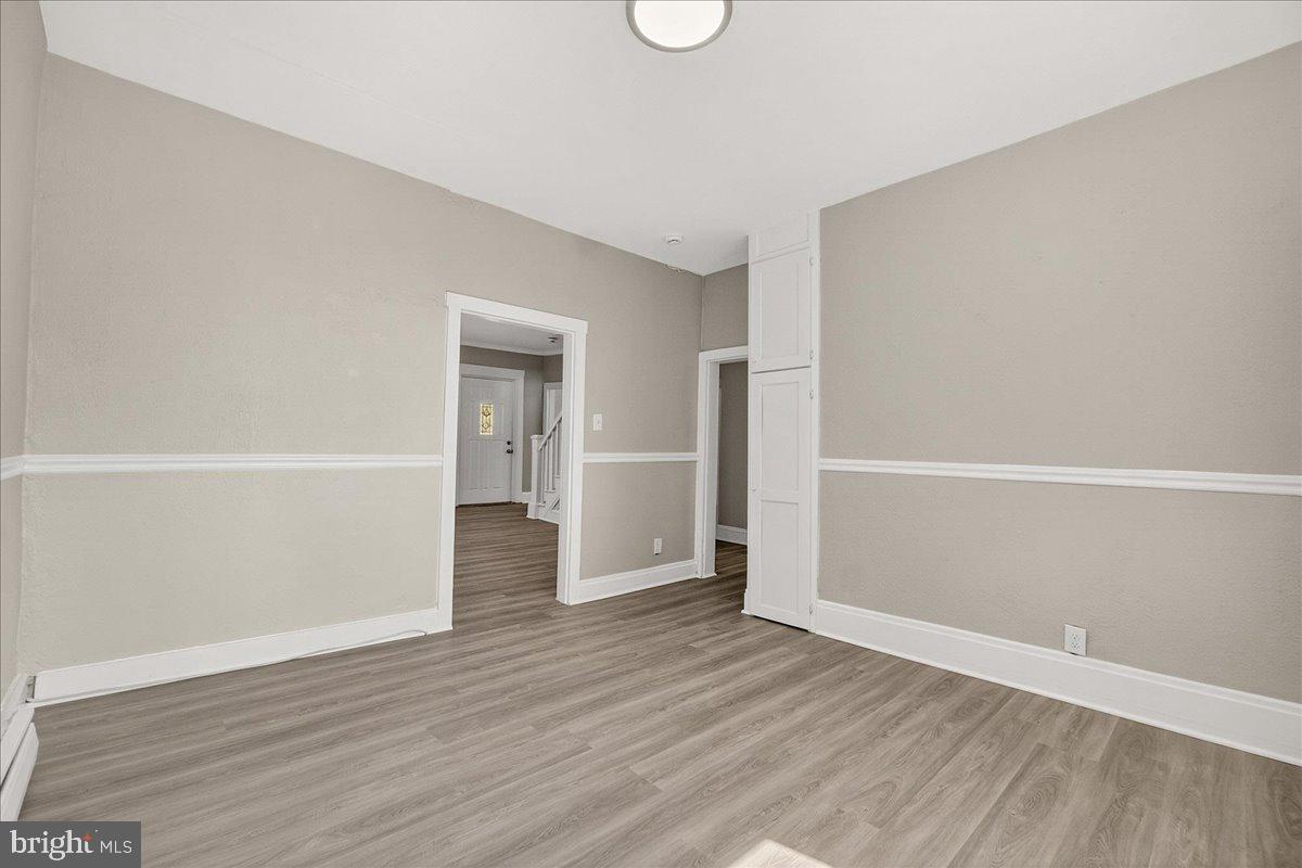 6215 South Clifton Road Braddock Heights, MD 21703 - Photo 9 of 46 wooden floor in an empty room
