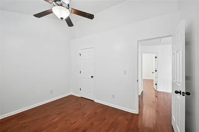 an aerial view of a house with a yard basket ball court and outdoor seating