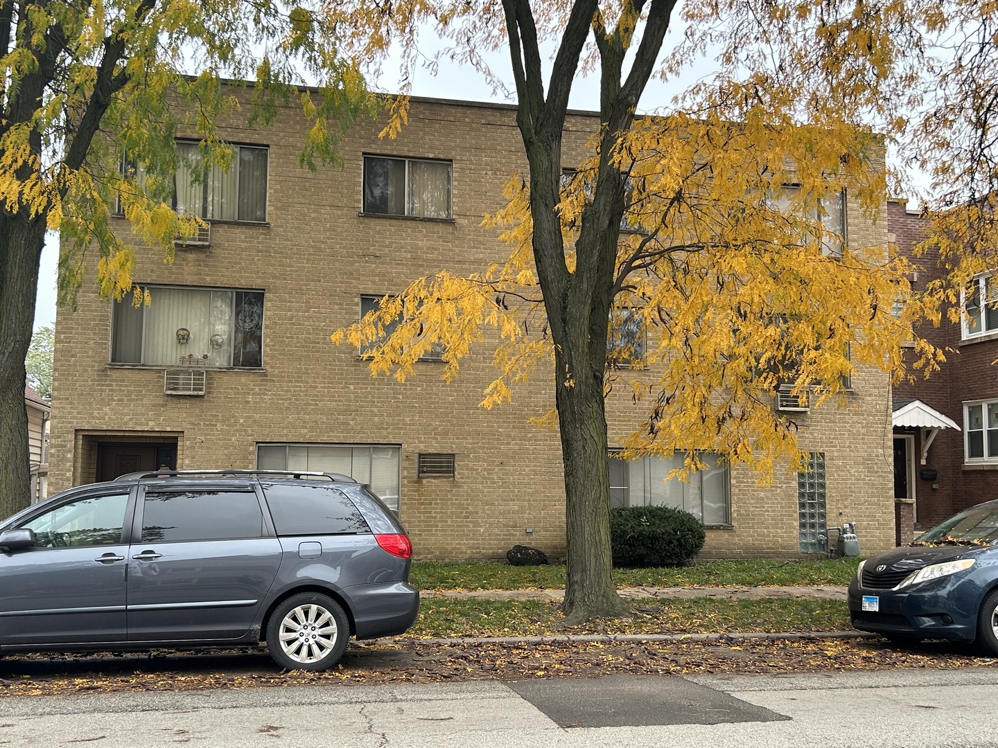 2825 Ridgeland Avenue, Unit 10 Berwyn, IL 60402 - Photo 1 of 8 a front view of a house with parking space