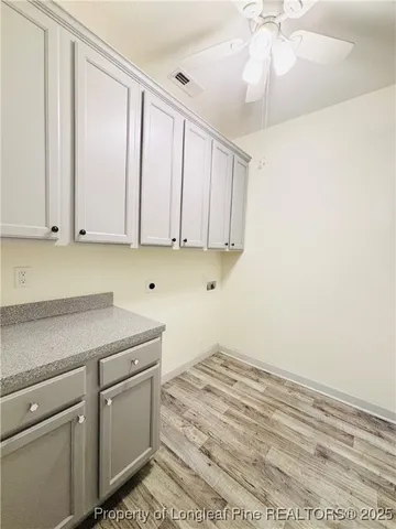 a view of a kitchen with a sink