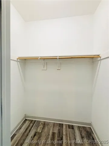 a view of a room with a dishwasher and a window