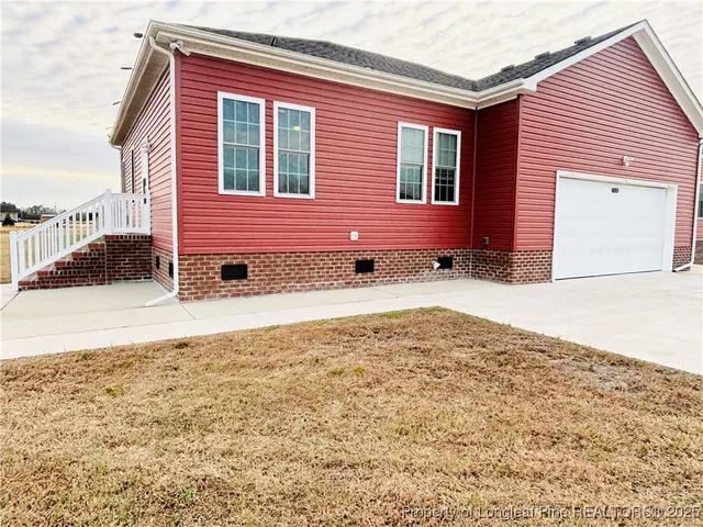a view of a house with a snow