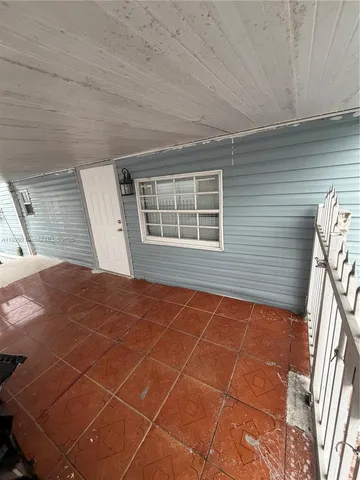 a view of a backyard of a house