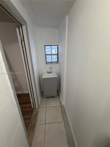 a bathroom with a bathtub sink and toilet