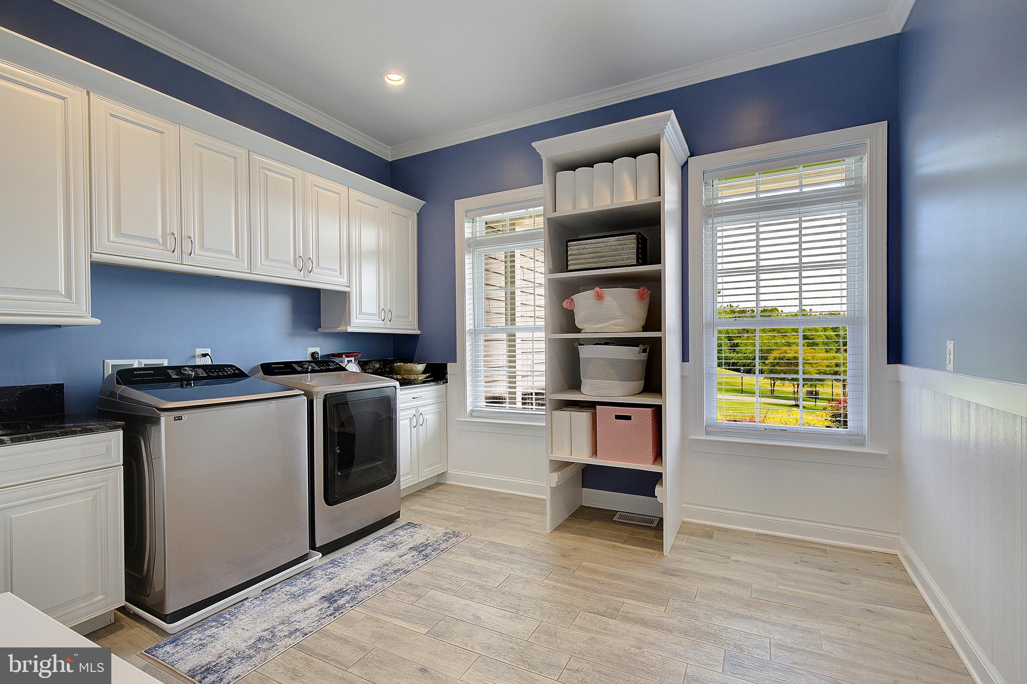 2393 Garrity Road St. Leonard, MD 20685 - Photo 36 of 76 Spacious laundry room with custom cabinetry.