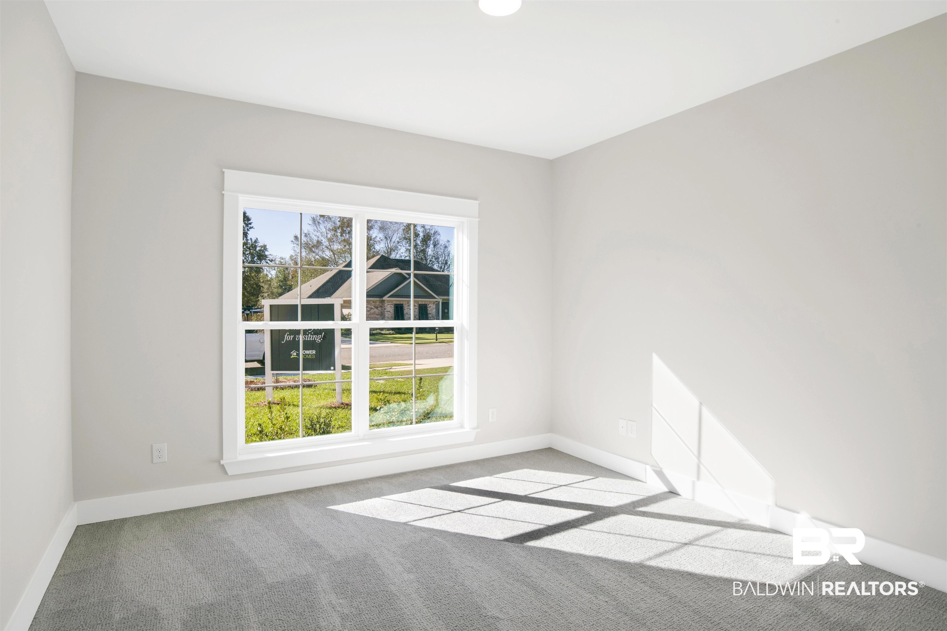 9687 Widgeon Court Daphne, AL 36526 - Photo 24 of 40 Main level Unfurnished room with light colored carpet