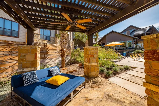 a view of swimming pool with outdoor seating