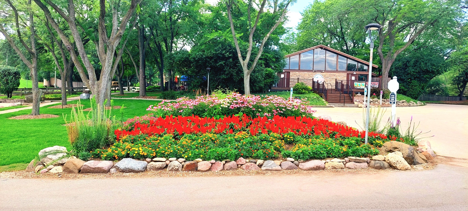 6010 Forest View Road, Unit 1A Lisle, IL 60532 - Photo 31 of 39 a front view of a house with a yard and fountain