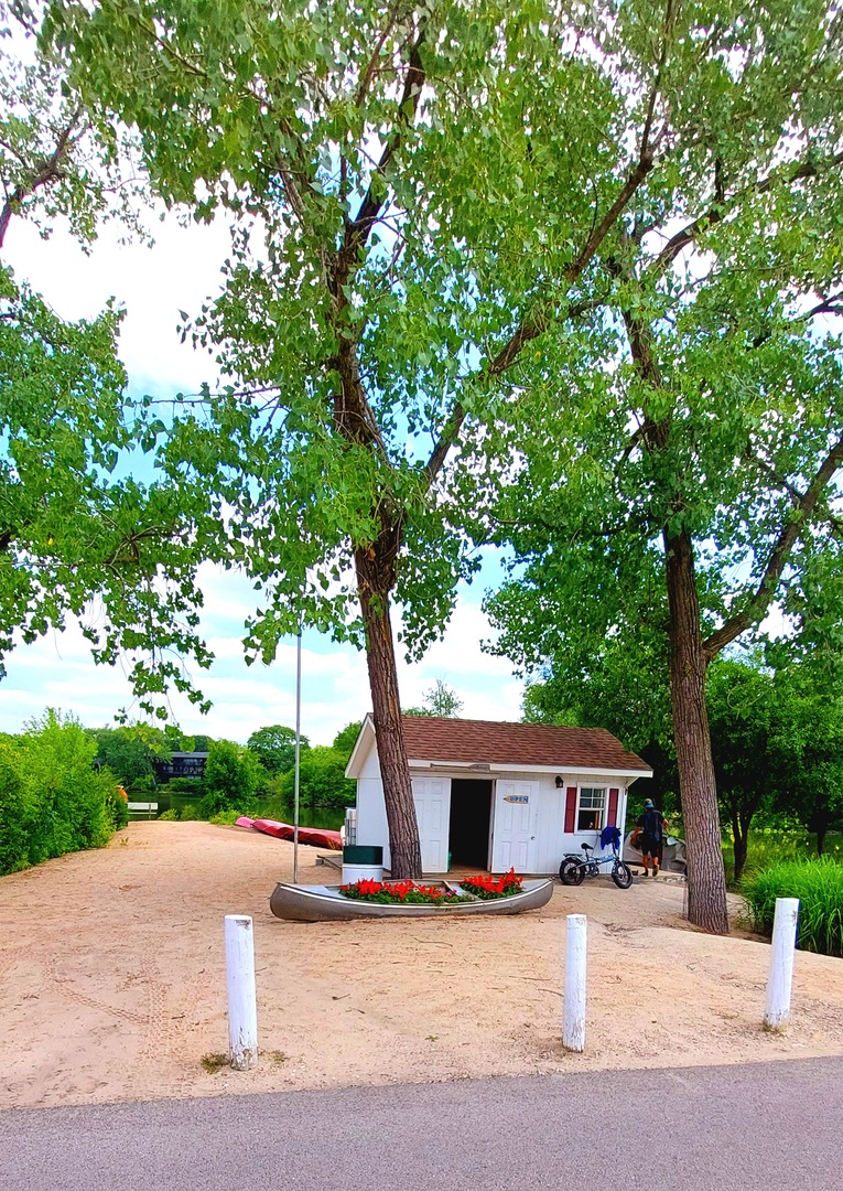 6010 Forest View Road, Unit 1A Lisle, IL 60532 - Photo 32 of 39 a view of a house with tree s