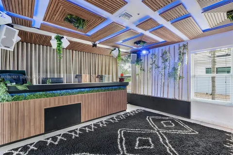 a view of a patio with couches and table in patio