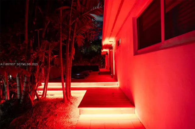 a view of a backyard with a patio