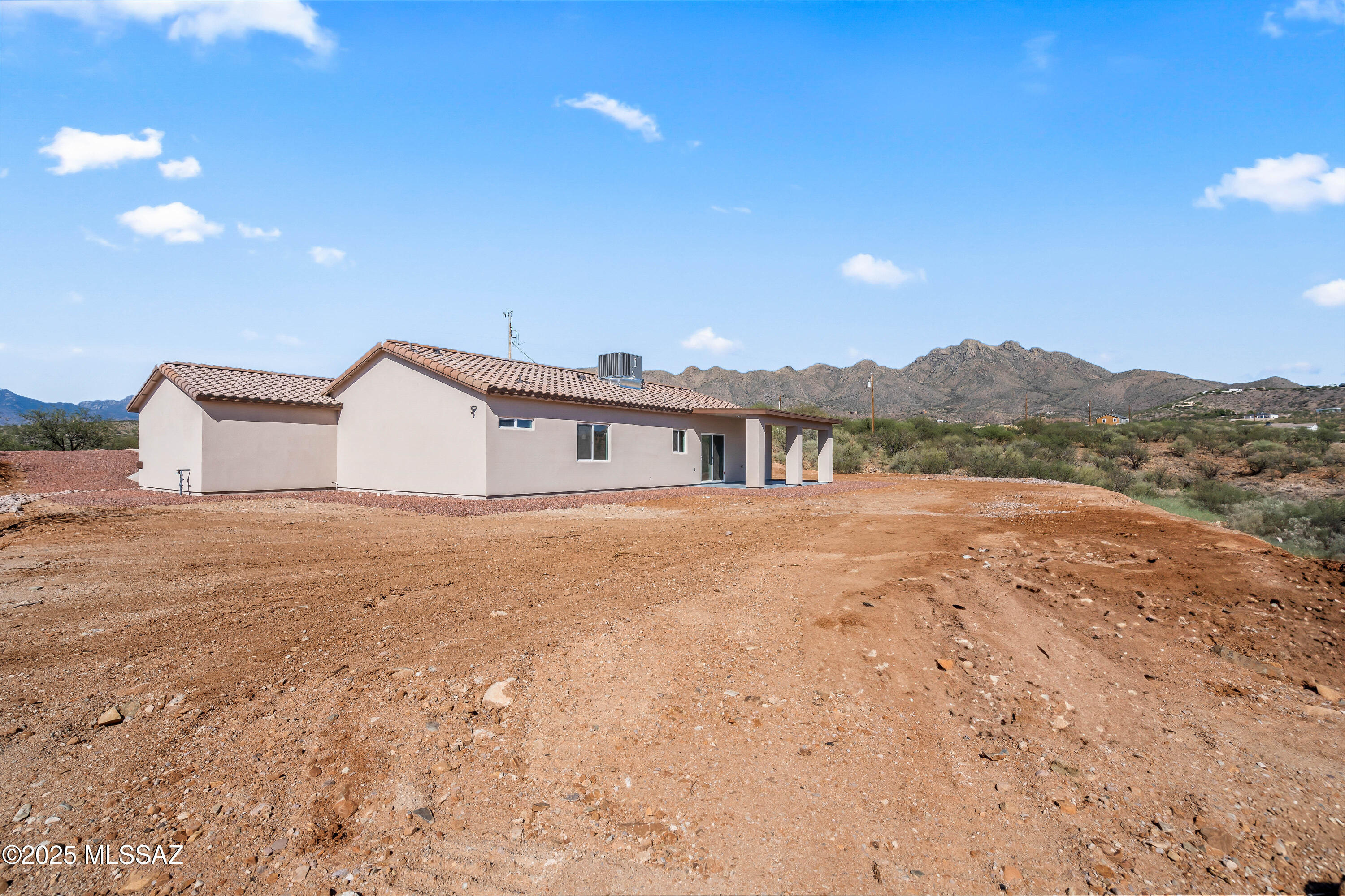 1674 Calle Cabo Rio Rico, AZ 85648 - Photo 30 of 33 a house view with a garden space