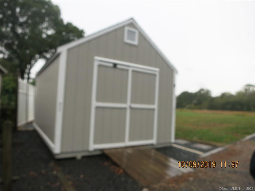22 Garnet Park Road Madison, CT 06443 - Photo 18 of 18 This out building is perfect for storage.