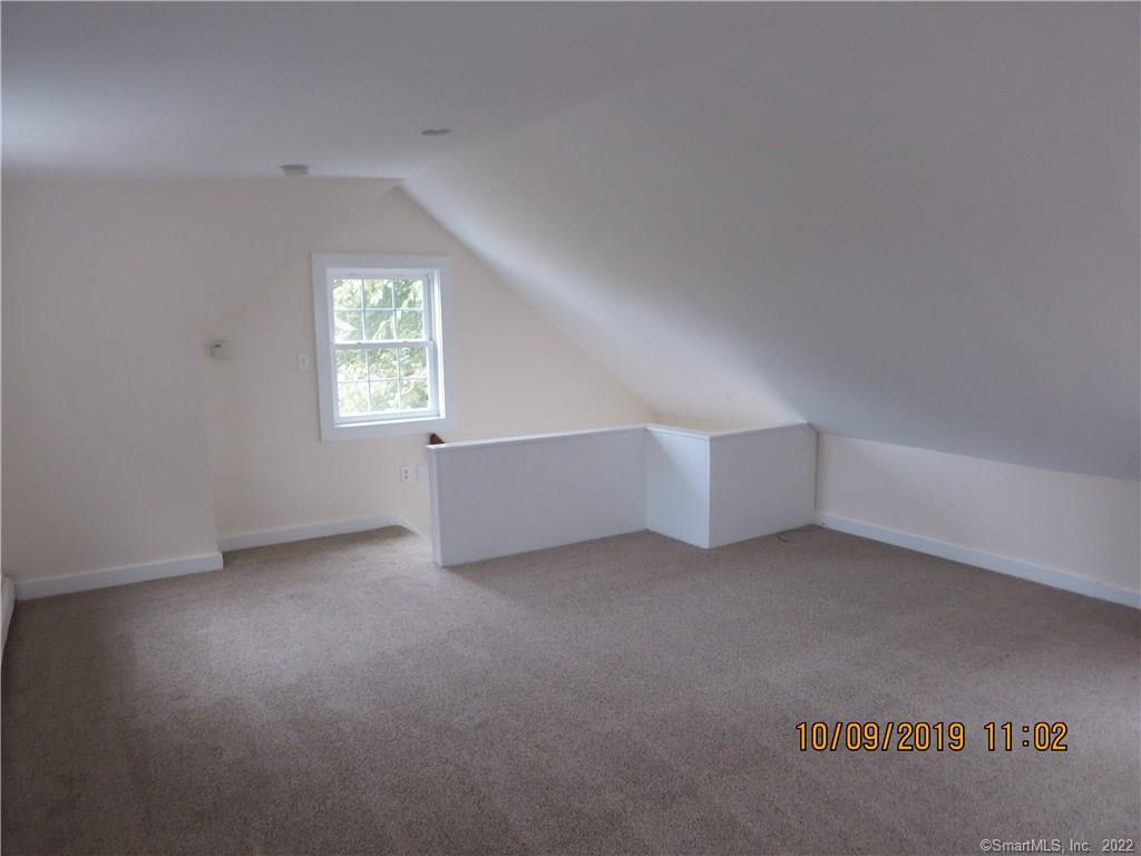 22 Garnet Park Road Madison, CT 06443 - Photo 8 of 18 The bedroom with a vaulted ceiling