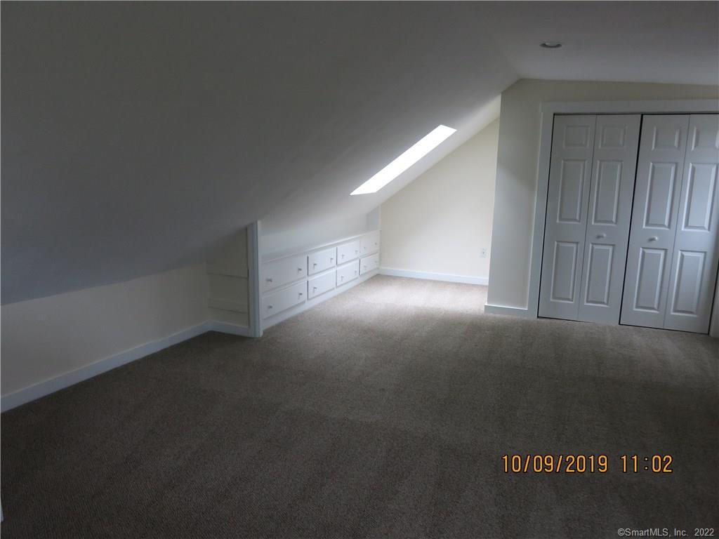 22 Garnet Park Road Madison, CT 06443 - Photo 9 of 18 Bedroom with many built in drawers and a good sized closet.