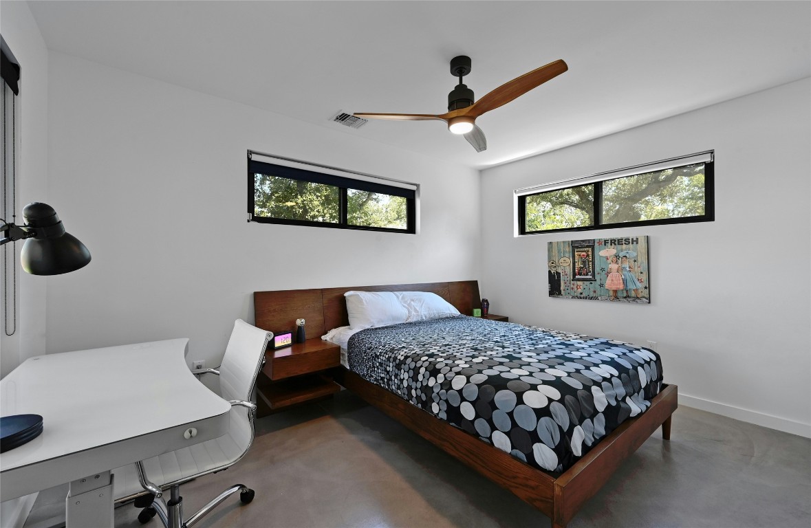 407 South Park Drive, Unit 2 Austin, TX 78704 - Photo 14 of 25 a bedroom with a bed and a wall painting