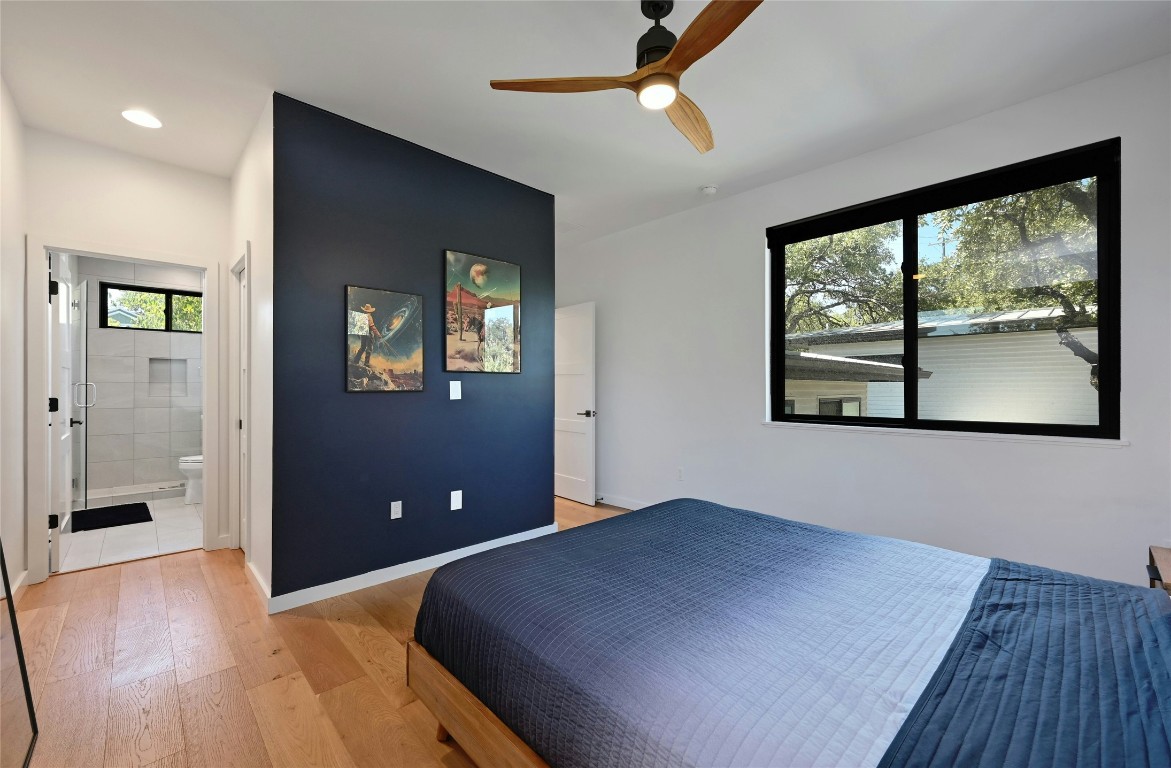 407 South Park Drive, Unit 2 Austin, TX 78704 - Photo 20 of 25 a bedroom with a bed and a window