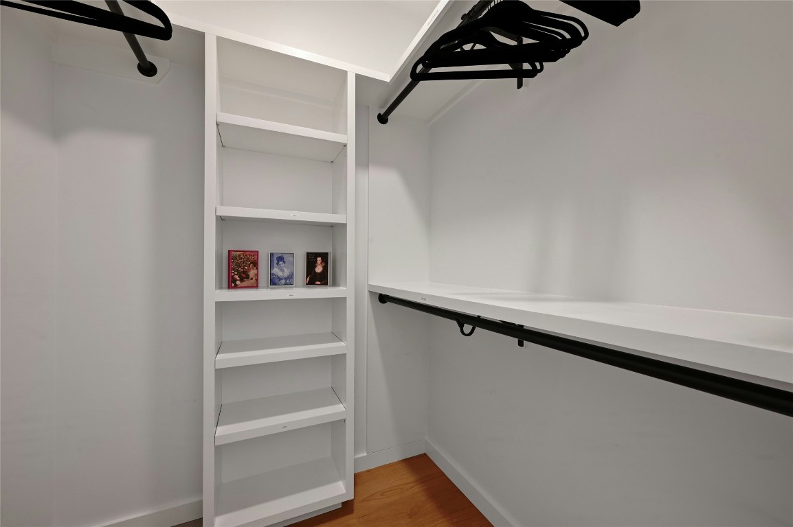 407 South Park Drive, Unit 2 Austin, TX 78704 - Photo 22 of 25 a view of walk in closet with empty racks