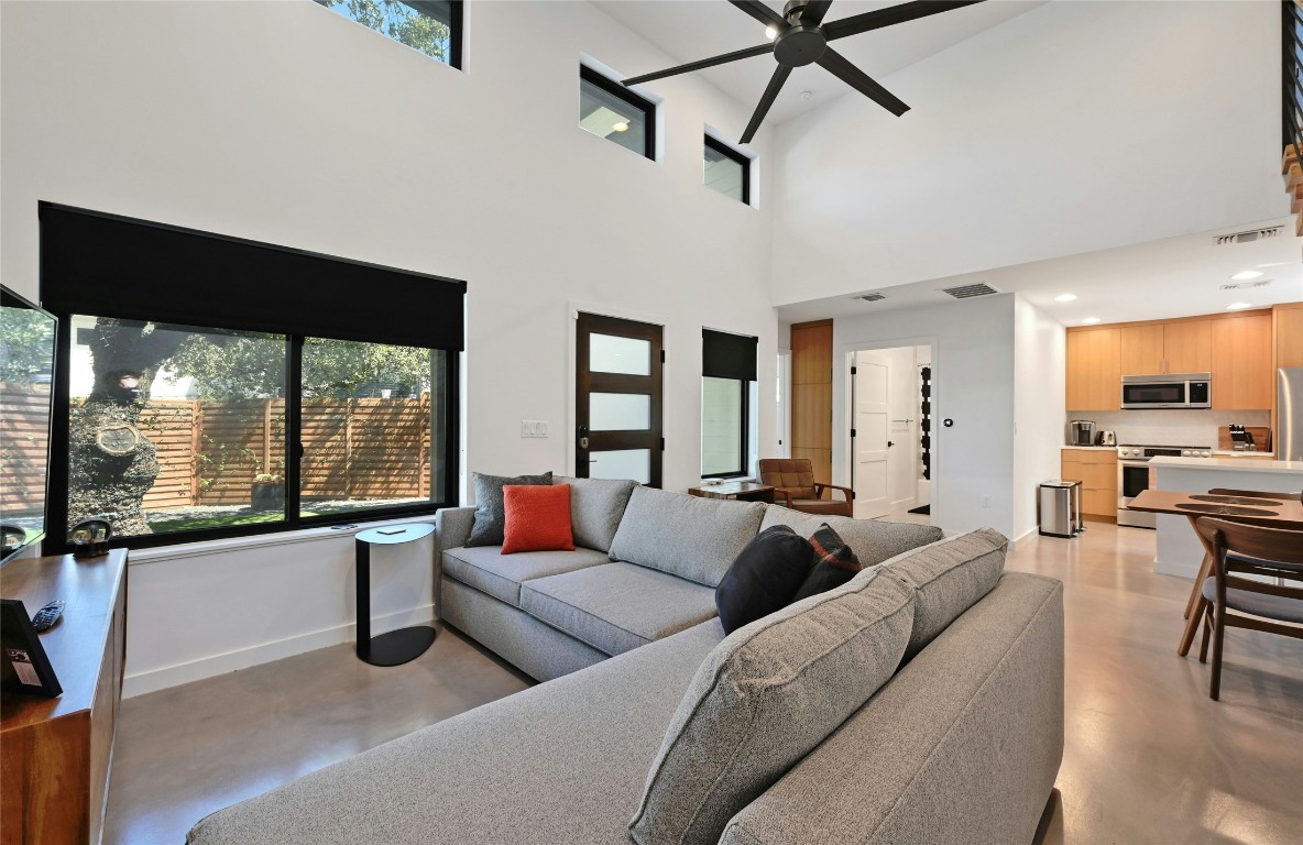 407 South Park Drive, Unit 2 Austin, TX 78704 - Photo 8 of 25 a living room with furniture and a large window