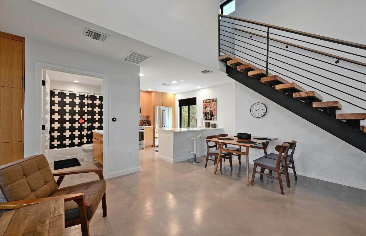 407 South Park Drive, Unit 2 Austin, TX 78704 - Photo 10 of 25 a dining room with furniture and wooden floor