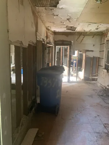 a view of a hallway with seating