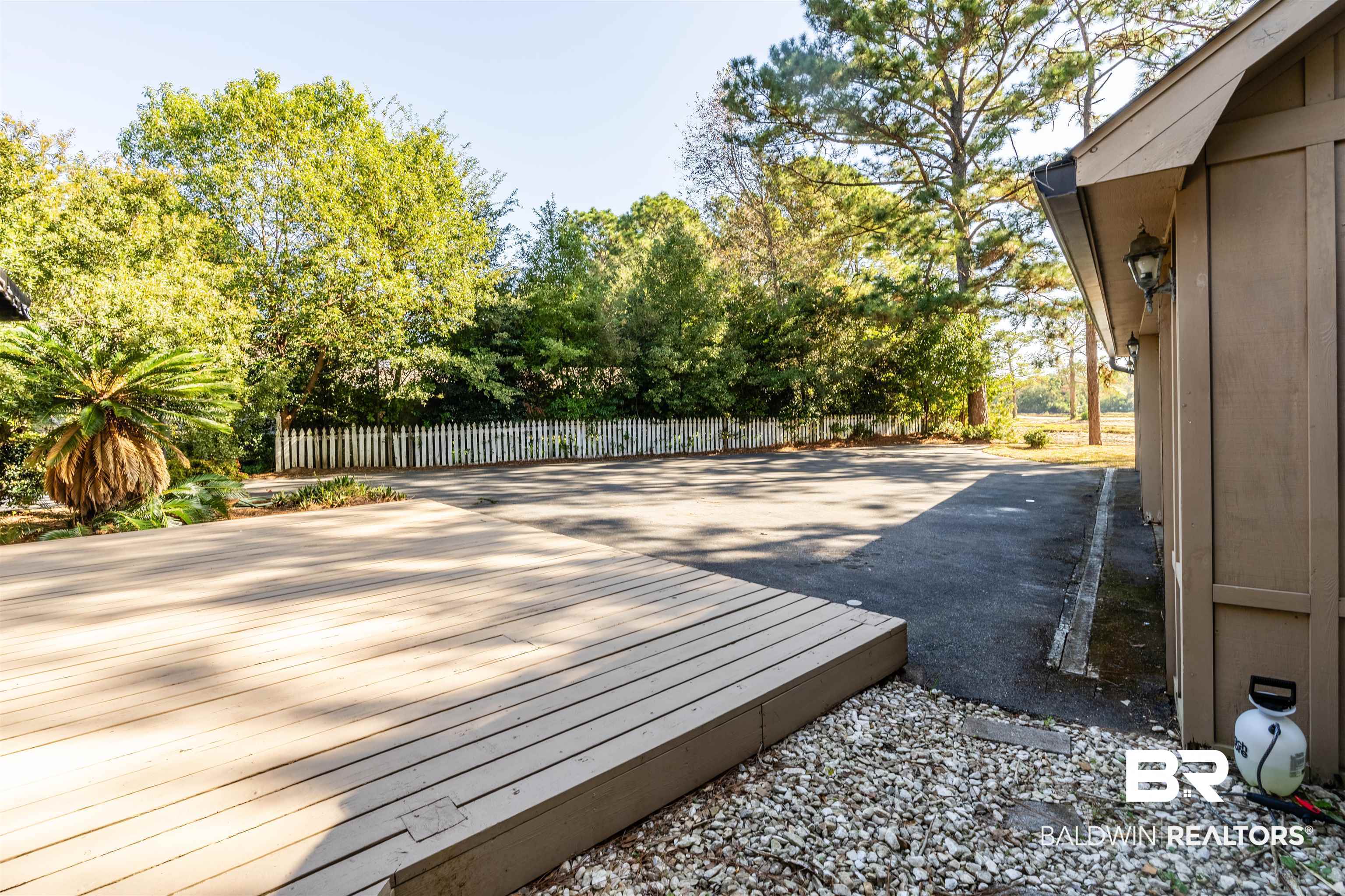 3821 St Andrews Loop East Mobile, AL 36693 - Photo 39 of 41 Wooden deck featuring a patio area