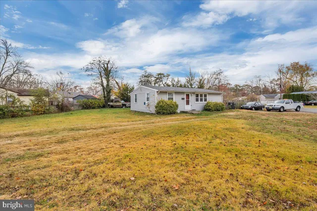 a view of a large body of water with a building in the background